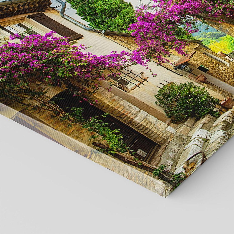 Obraz na płótnie - uliczka, kwiaty, budynki