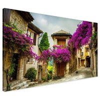Obraz na płótnie - uliczka, kwiaty, budynki